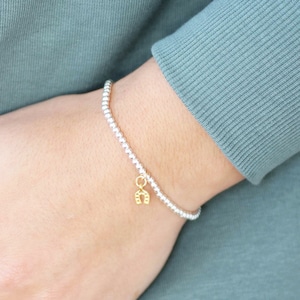 Lucky horseshoe beaded charm bracelet