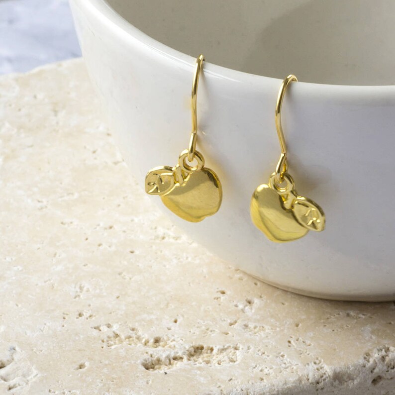 Gold apple charm earrings image 3