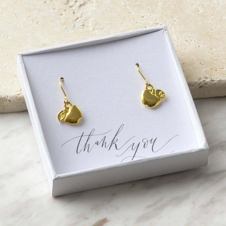Gold apple charm earrings image 2