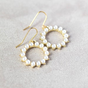 Gold sunburst pearl earrings image 2