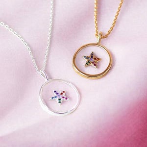 Glass pendant with pave star detail