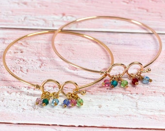 Infinity bangle with family birthstones