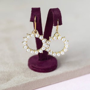 Gold sunburst pearl earrings image 4