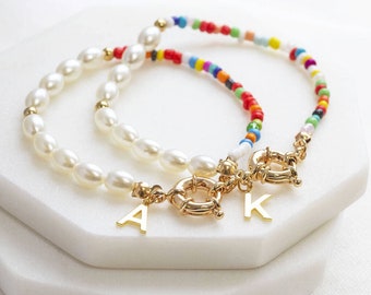 Personalised pearl and multicoloured seed bead bracelet with gold initial