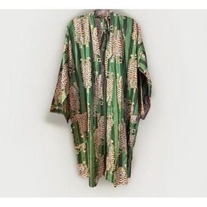 May include: A long-sleeved open-front robe in a deep green hue, featuring a repeating pattern of tan and brown tigers arranged in vertical columns. The garment has a relaxed, flowing silhouette with wide sleeves and a simple, unfastened neckline.