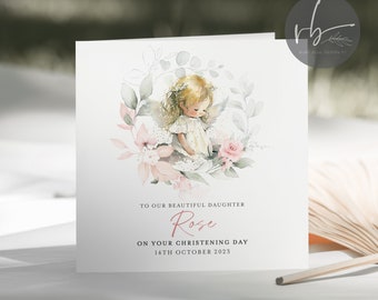 May include: A watercolor illustration of a little girl angel with wings, wearing a white dress and a floral crown, surrounded by pink and green flowers. The text reads "To our beautiful daughter Rose on your christening day 14th October 2023".