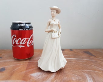 Collectibles lady figurines, lady figurine, women figurine, lady sculpture, pottery figurine, pottery lady figure, pride of place, lady
