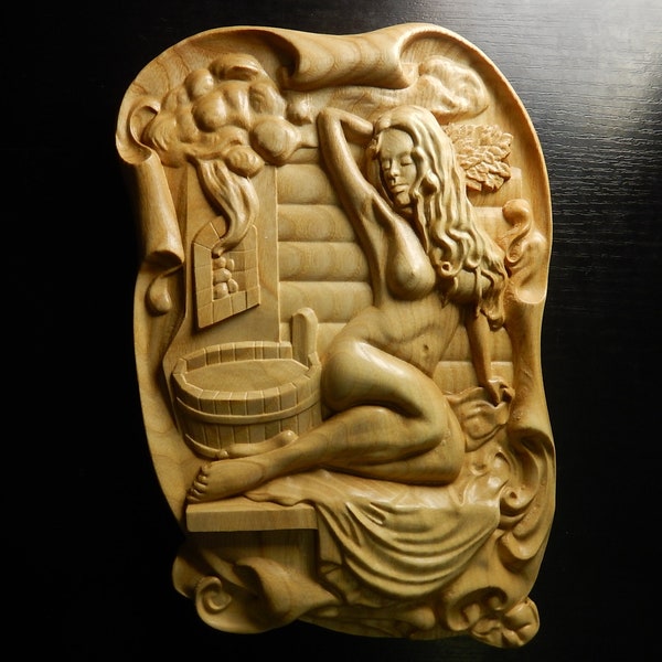 Wood carved picture. Woman taking bath. Perfect sauna bania decoration