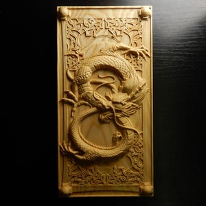 Wood carved picture wall decoration plaque. Dragon in shape of lucky eight. Perfect gift