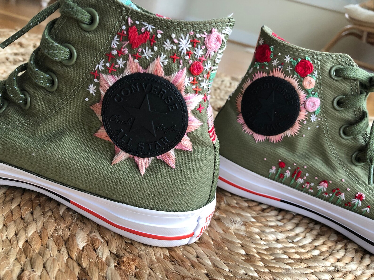 beige converse with flowers