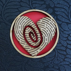 May include: A wooden heart-shaped ornament with a swirling fingerprint pattern, set against a red background.