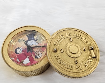 Walt Disney Scrooge McDuck “Time is Money” Brass Vault Coin Battery Clock