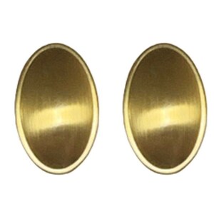 May include: A pair of gold oval-shaped earrings. The earrings have a brushed finish.