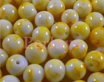 Lot de 100 perles en verre jaune - blanche effet tacheté REF1029