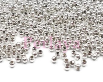 500 perles rondes en métal argentées 1.5mm REF856&1917