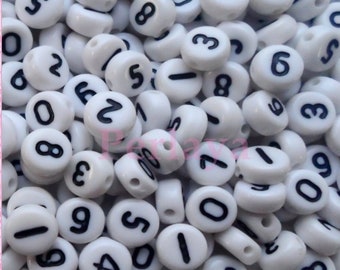 500 white acrylic REF1083 numbers 7mm beads