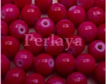 Lot de 100 perles en verre fushia effet tacheté REF850