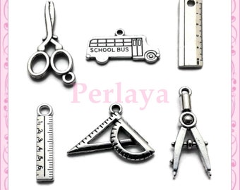 Lot of 18 school charms - ruler, square, scissors, compass, bus REF740