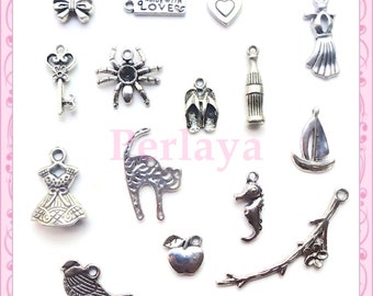 Mix of 60 charms Silver Bow, heart, dress, bird, love, cat. REF085