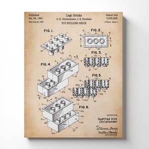 May include: A vintage print of a Lego Bricks patent illustration. The diagram shows various views of the toy building brick, including top, side, and isometric perspectives. The print has a sepia tone, with the text "Lego Bricks" and "TOY BUILDING BRICK" at the top.