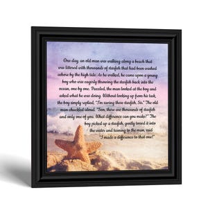 May include: A framed wall art piece featuring a beach scene with a starfish in the foreground and a sunset sky. The text reads: One day, an old man was walking along a beach that was littered with thousands of starfish that had been washed ashore.