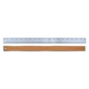 May include: A silver ruler with black markings, measuring 18 inches. The ruler has a cork backing.