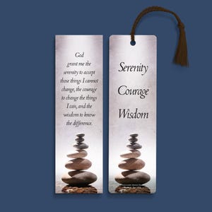 May include: Two rectangular bookmarks with a brown tassel. One bookmark has the text "God grant me the serenity to accept those things I cannot change..." The other bookmark reads "Serenity, Courage, Wisdom." Both have a stack of stones.