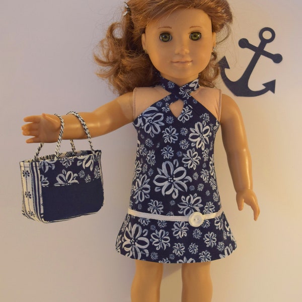 Handmade classy navy & white floral print halter dress. Neck straps tie in back. Purse included. Made to fit like american girl doll clothes