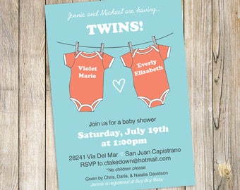 May include: A blue baby shower invitation with a white border. The invitation features two red onesies hanging on a clothesline with the names "Violet Marie" and "Everly Elizabeth" written on them. The invitation also includes the text "Jennie and Michael are having... TWINS!" and details about the baby shower.