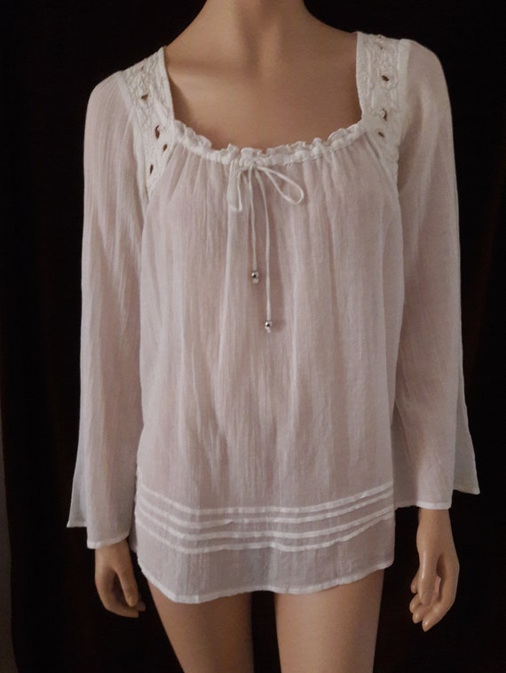 cream colored peasant blouse