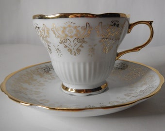 Vintage Teacup and Saucer Gold and White 1950s Made in China Base Mark H