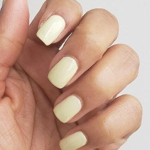 Light yellow nail polish image 1