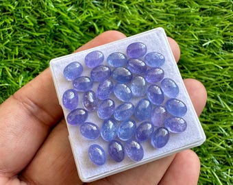 AAA+ tanzaniet cabochons: natuurlijk ovaal edelsteen van 5 x 7 mm
