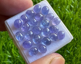 AAA+ tanzaniet cabochons: veel natuurlijke ovale edelstenen (4 x 5 mm)
