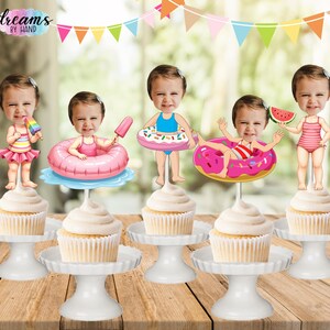 May include: Five cupcake toppers featuring illustrated children with photo-realistic faces in summer swimwear. The designs include children with a popsicle, a pink inner tube, a blue inner tube, a donut float, and a slice of watermelon.