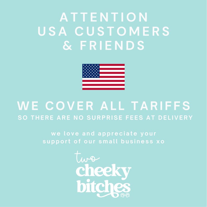 May include: A light blue graphic with the text "ATTENTION USA CUSTOMERS & FRIENDS" and an American flag. The text "WE COVER ALL TARIFFS" is also displayed, along with the business name "two cheeky bitches".