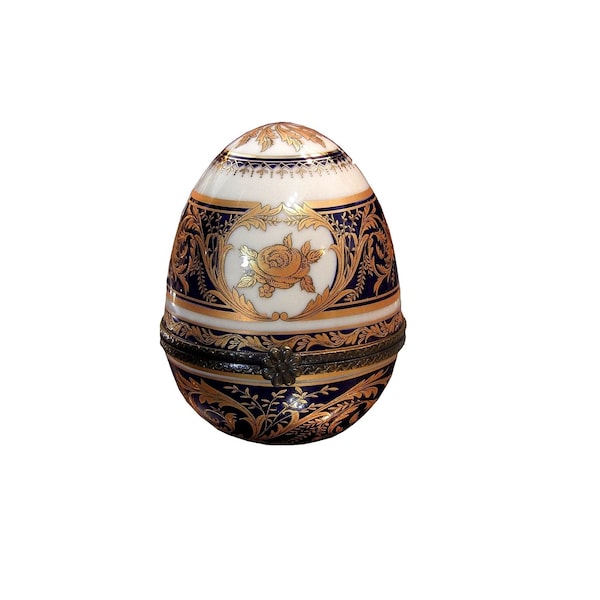 Classic and lovely egg-shaped porcelain trinket box.Porcelain Box and Lid in Faberge Egg style. Home decor, Gift
