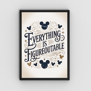 May include: Framed art print with the phrase "Everything is Figureoutable" in navy blue and gold lettering. The design includes Mickey Mouse silhouettes and decorative flourishes on a cream-colored background, framed in black.