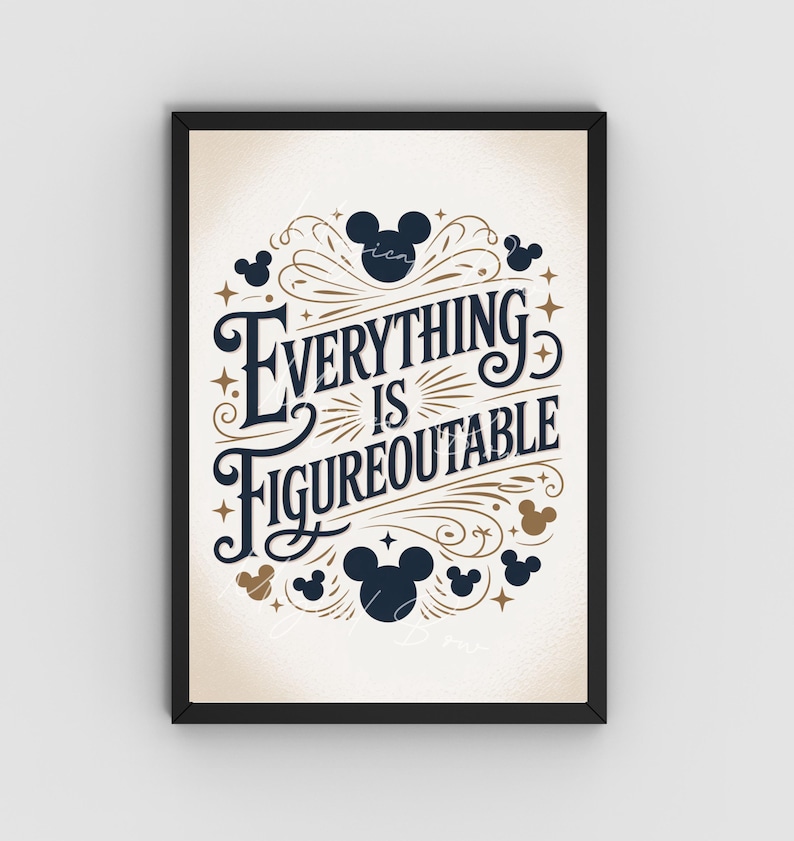 May include: Framed art print with the phrase "Everything is Figureoutable" in navy blue and gold lettering. The design includes Mickey Mouse silhouettes and decorative flourishes on a cream-colored background, framed in black.