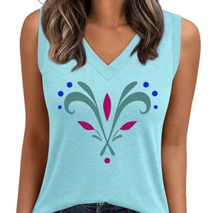 May include: A light blue sleeveless top with a V-neck. The shirt features a floral design in teal, pink, and blue. The floral design is centered on the front of the shirt. The top is made of a soft material.