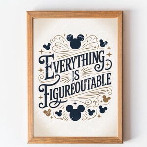 May include: Wooden framed print with the text "Everything is Figureoutable" in navy blue script. The design includes Mickey Mouse silhouettes and gold accents on a cream background. A decorative wall art piece.