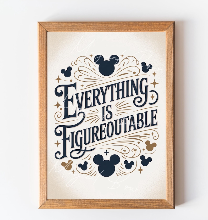 May include: Wooden framed print with the text "Everything is Figureoutable" in navy blue script. The design includes Mickey Mouse silhouettes and gold accents on a cream background. A decorative wall art piece.