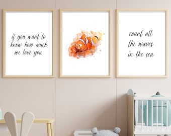 May include: Three watercolor prints with a light blue background. The left print has the text "if you want to know how much we love you". The middle print features a watercolor illustration of two orange and white clownfish. The right print has the text "count all the waves in the sea".