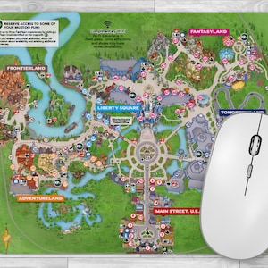 May include: A colorful map of a theme park with different land areas labeled, including Frontierland, Fantasyland, Liberty Square, Adventureland, and Tomorrowland. The map also includes a key with icons and text indicating attractions, restaurants, and shops.