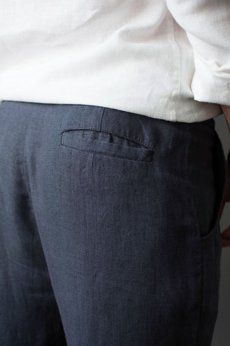 Close-up of back pocket on classic linen pants for men