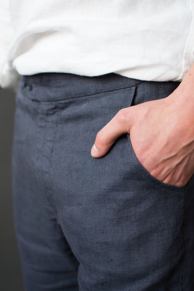 Hand in the side pocket of classic linen pants