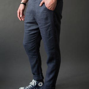 Close-up of side pockets on classic linen pants for men