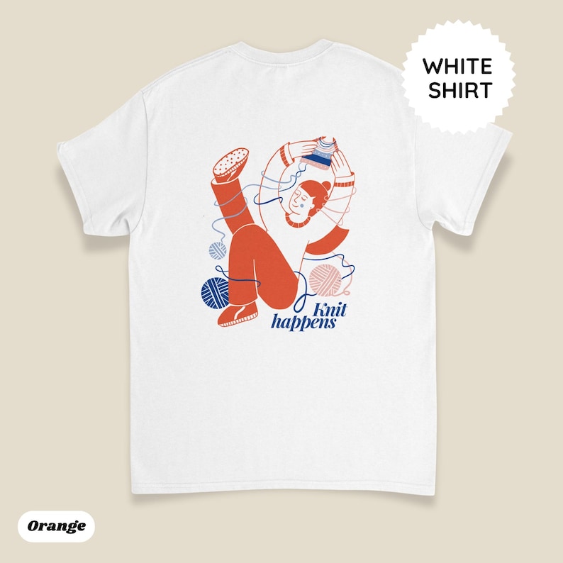 May include: White t-shirt with an orange illustration of a person knitting, surrounded by blue and pink yarn balls. The text "Knit happens" is below the illustration. A white circle with the words "WHITE SHIRT" is in the upper right corner.