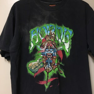 May include: Black t-shirt with a green, red, and blue graphic print of a samurai warrior with a guitar and swords. The text "FIGHTER" is printed in a stylized font above the warrior.