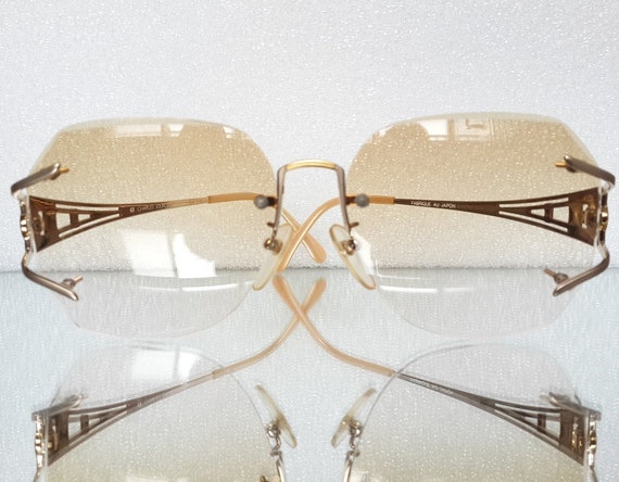 Charles Jourdan Sunglasses Oversize Square Frameless Brown